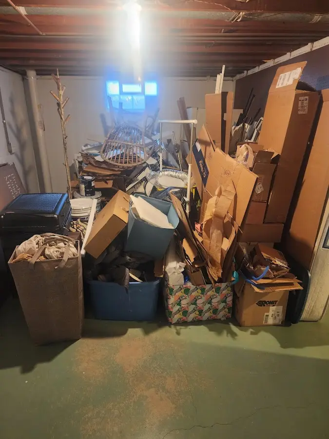 Roll-off dumpster container at job site for Yard Waste Dumpster Rental in Elsa